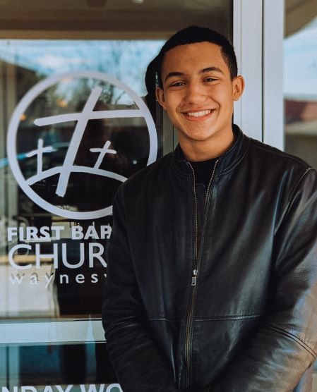 young man wearing a black jacket